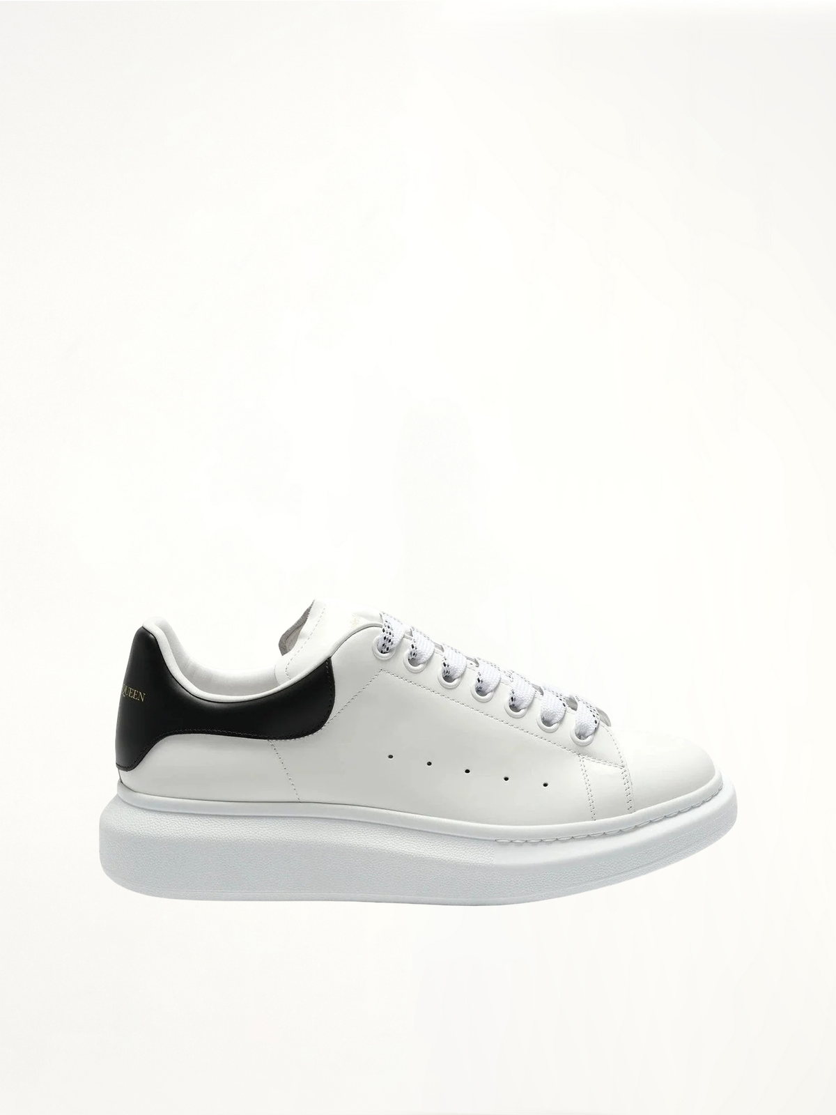 Larry Oversized Sneaker in White/Black Side View | ALEXANDER MCQUEEN