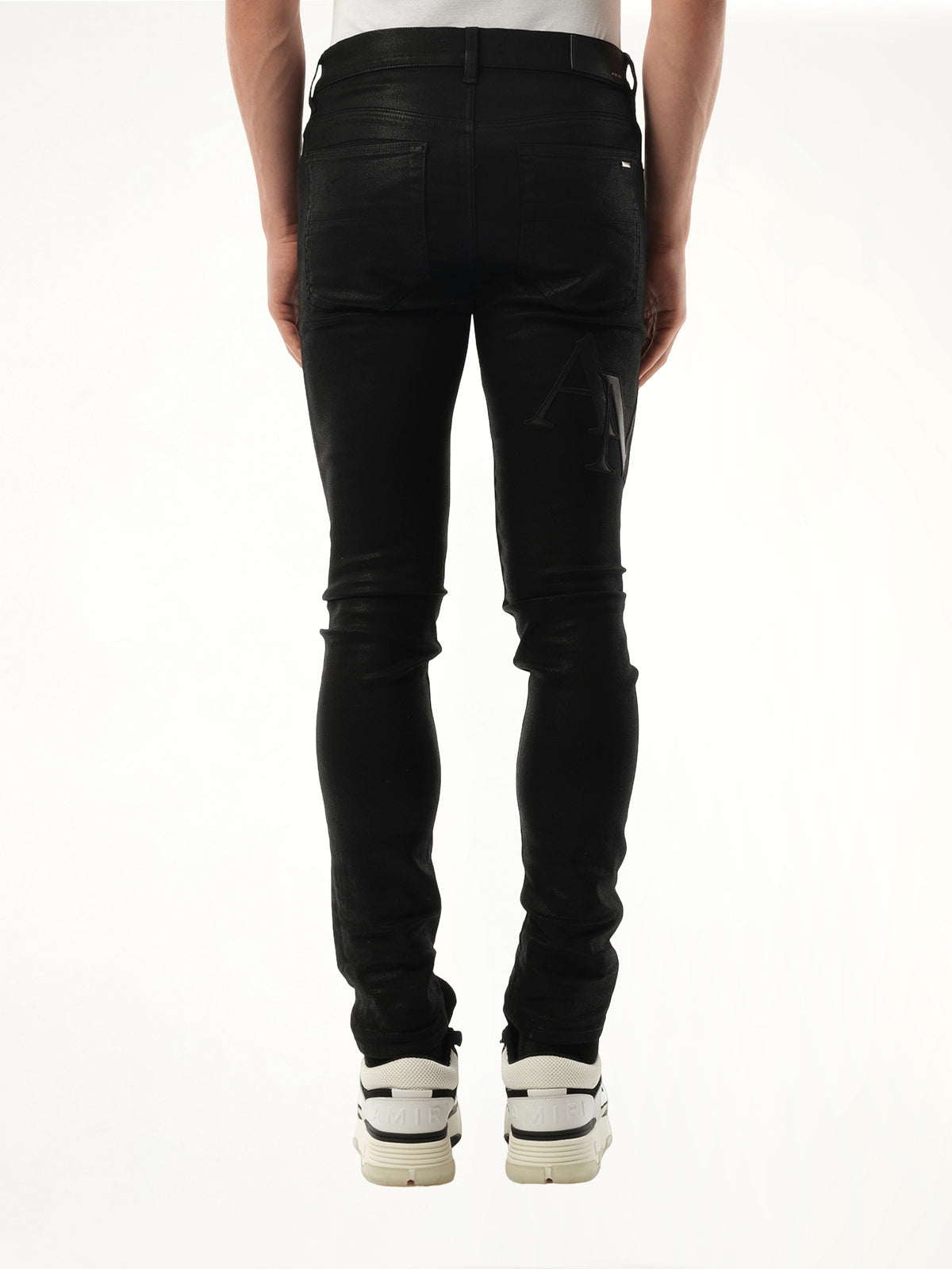 Waxed Staggered Logo Skinny Jeans in Black Wax