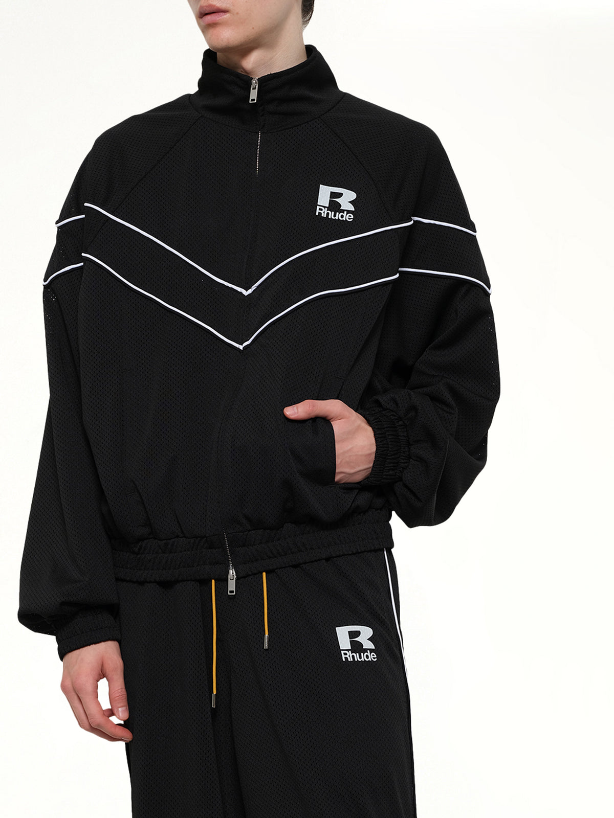 Rhude Mesh Piping Raglan Track Jacket in Black/White