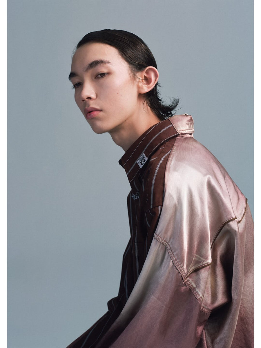 Maison Mihara Yasuhiro F/W 26 lookbook: a model in a metallic pink jacket