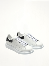 Larry Oversized Sneaker in White/Black Front View | ALEXANDER MCQUEEN