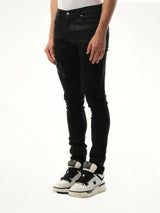 Waxed Staggered Logo Skinny Jeans in Black Wax