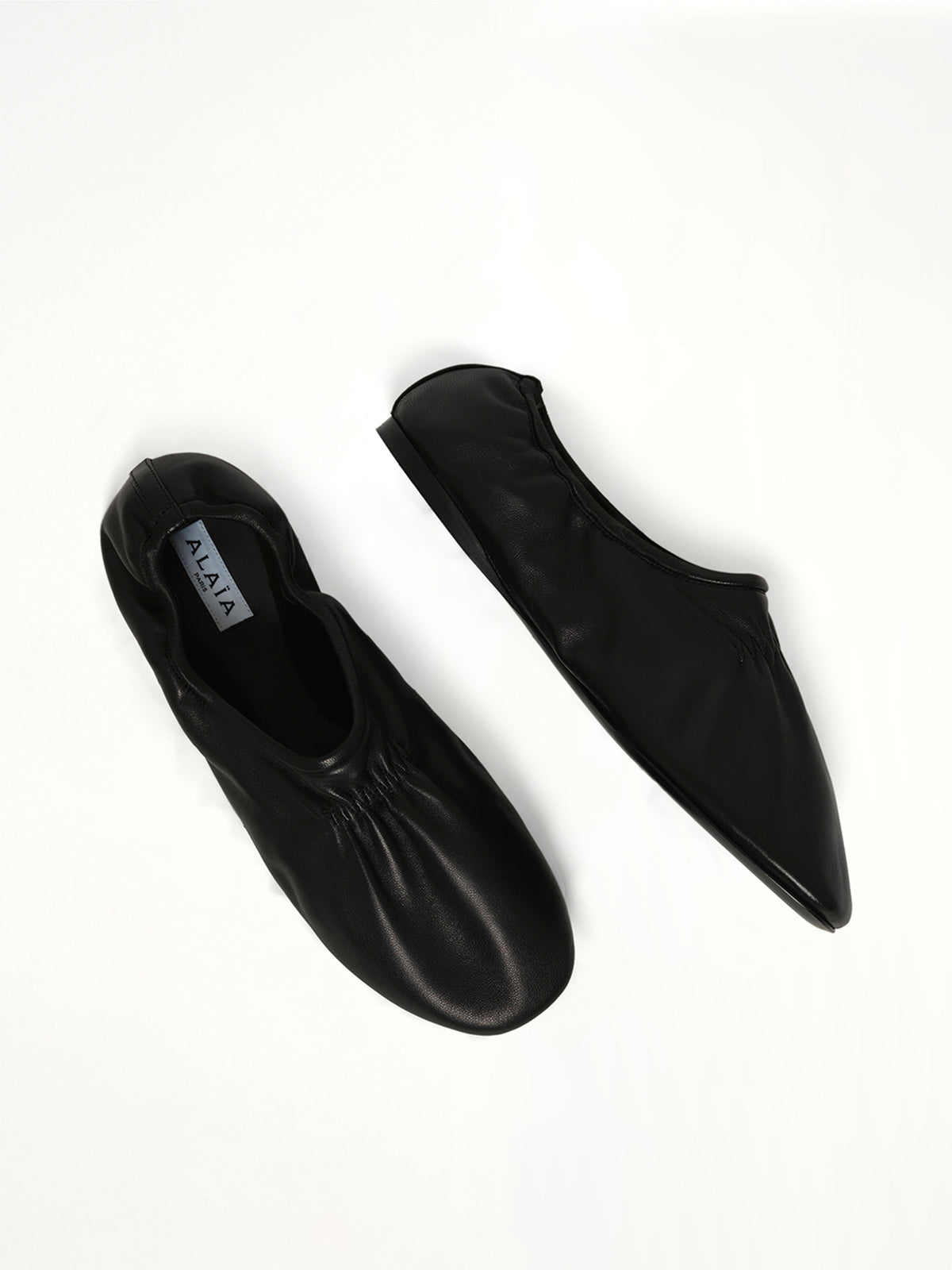 Supple Slippers in Black Top View | ALAIA