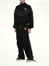 Rhude Mesh Piping Parachute Track Pant in Black/White