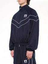 Rhude Mesh Piping Raglan Track Jacket in Navy/White